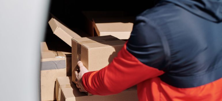 Professional mover loading boxes after they pack your electronics for a Boise move