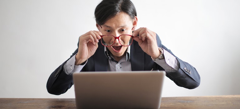 Man looking at a laptop.