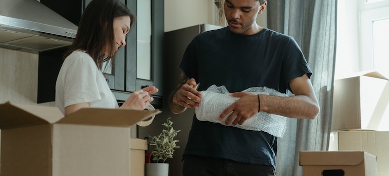 Man and woman packing.