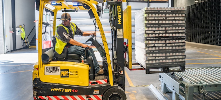 Man driving a forklift.