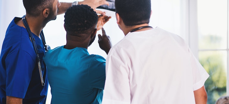 Doctors checking a scan.