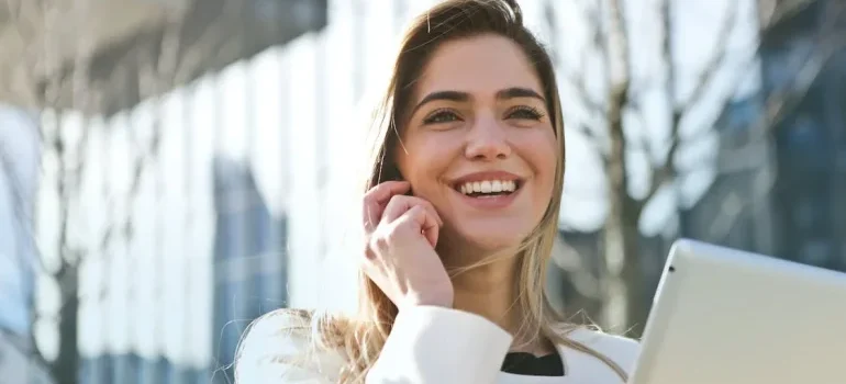 A young woman talking on the phone