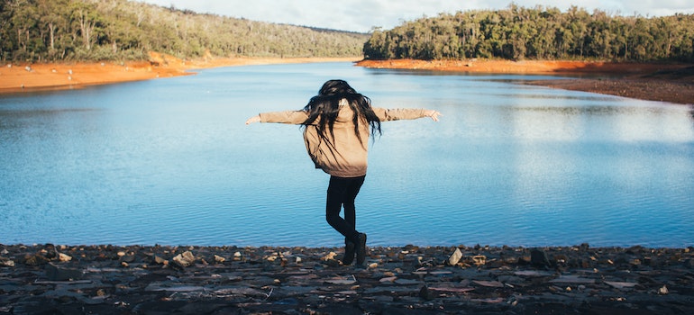 Woman by a river
