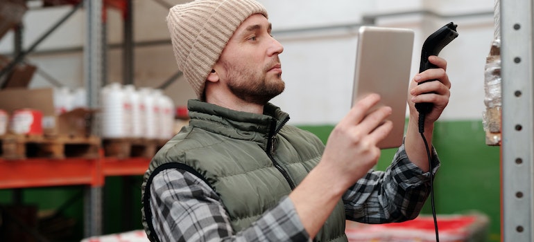 A man scanning goods will know about inventory management