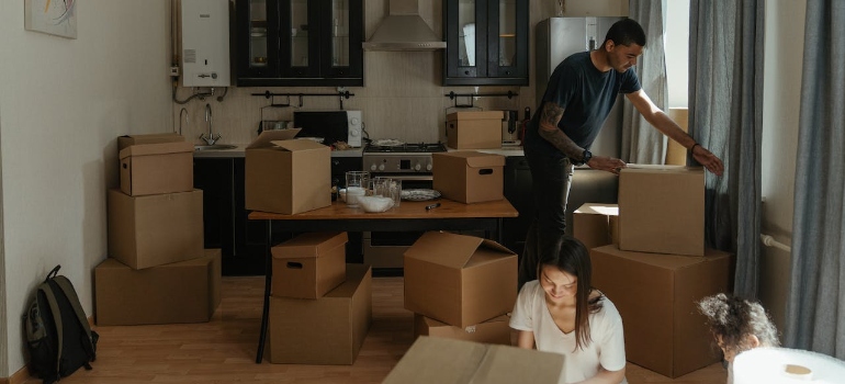 A family packing before using specialized moving solutions in Boise