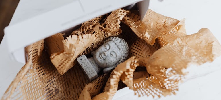 a tiny sculpture in a box