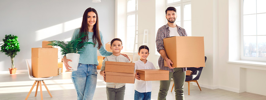 a happy family doing a moving together. Moving from Idaho to Oregon. 